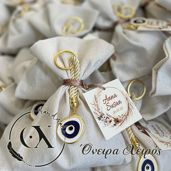 luxury μπομπονιέρα με μπρελόκ μάτι σε πουγκί